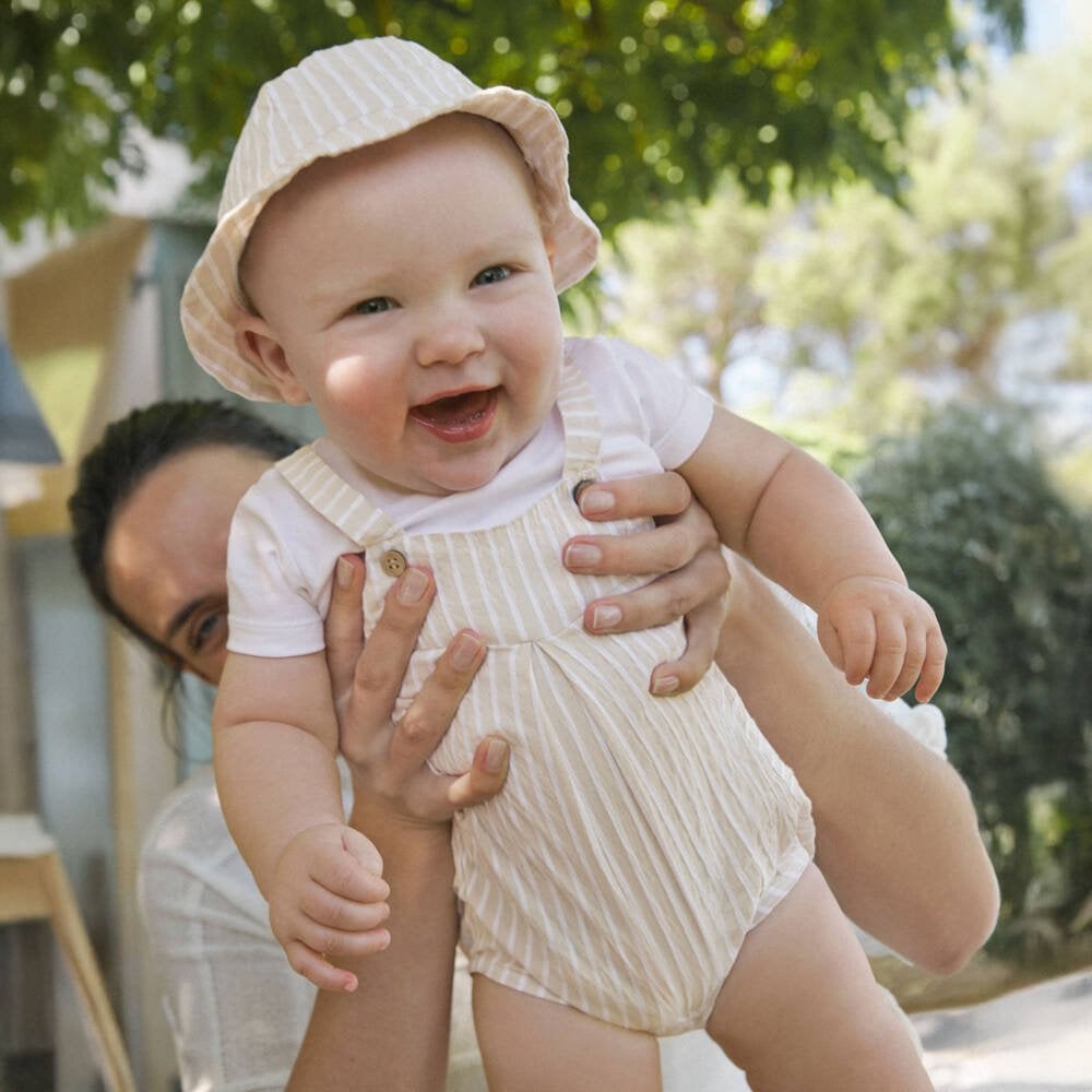Short bodysuit with hat