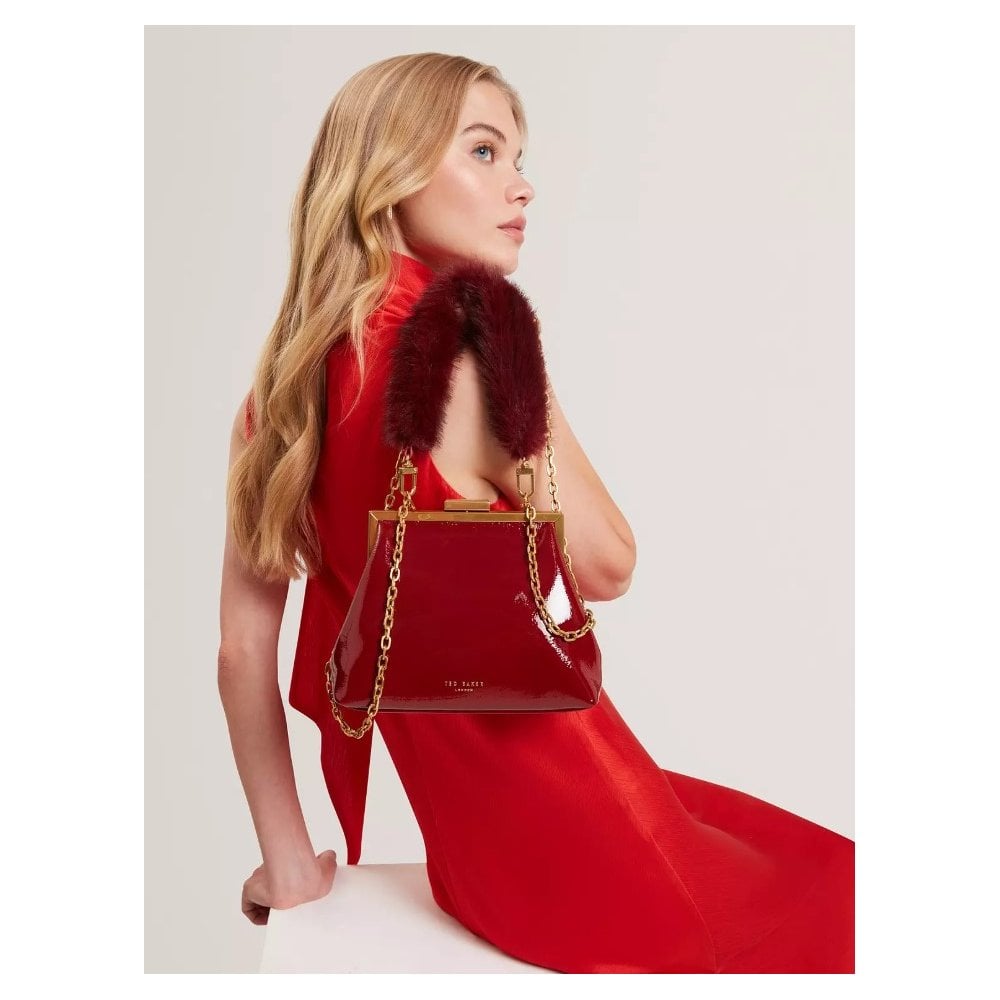 Purcel Patent Faux Fur Handle Clutch Bag